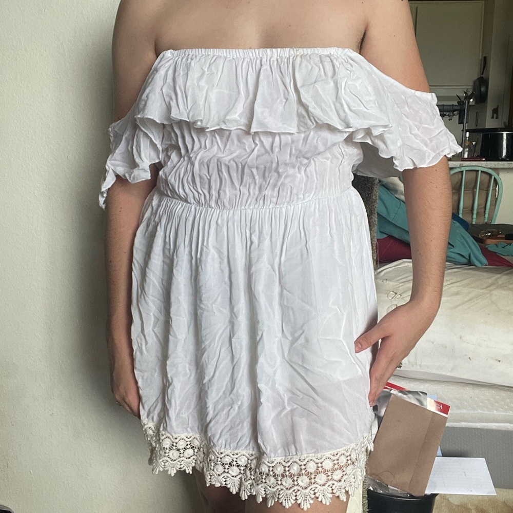 White strapless Elena Miro mid length dress with crochet trim